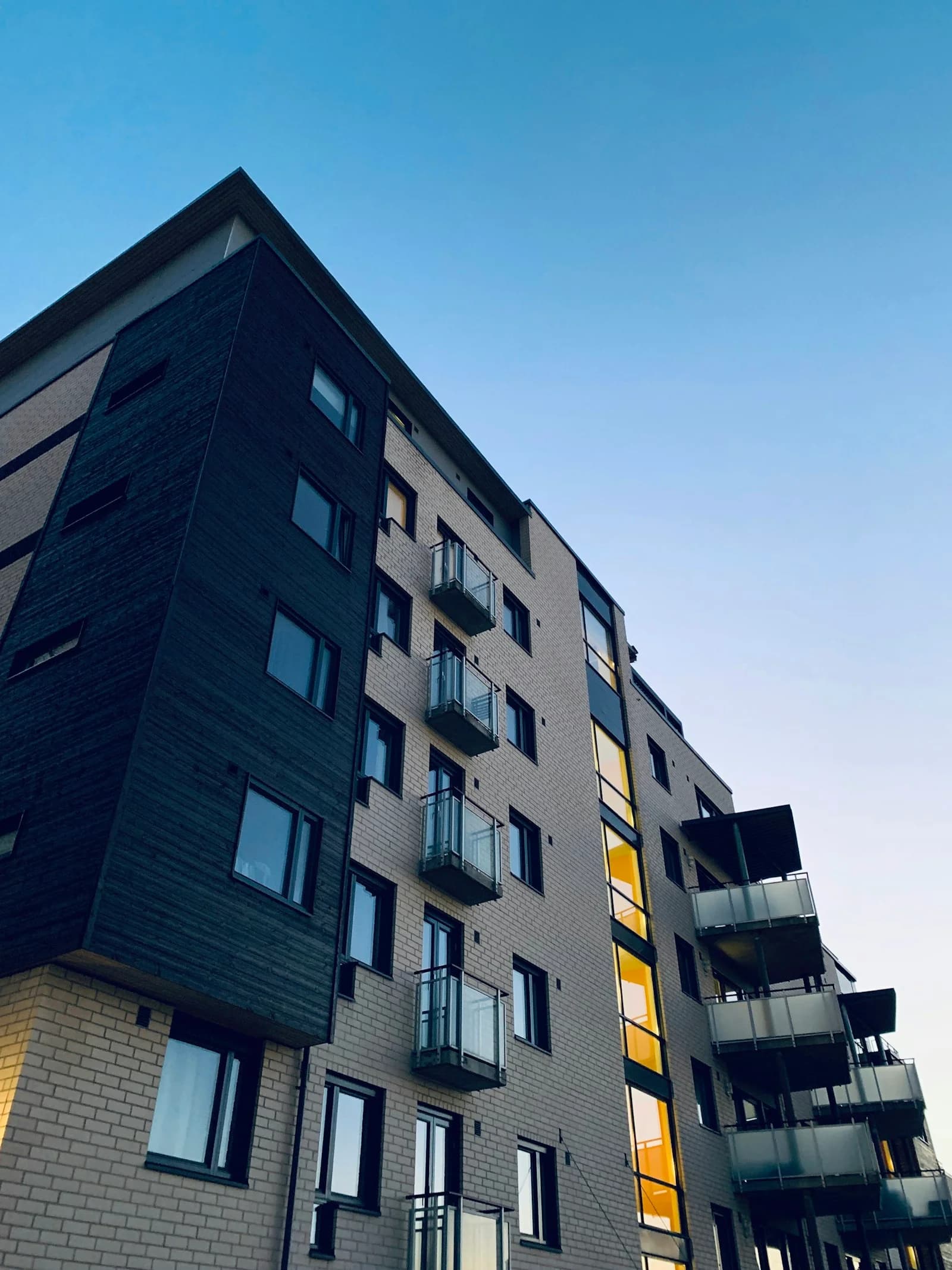 Two-bedroom condo facing Clark, Mabalacat — living room with floor-to-ceiling windows